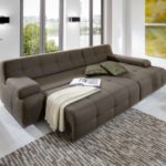 CAVADORE Eckcouch Boogies mit Longchair rechts/Schlaf-Sofa mit ausziehbarem Bett und großer Liegefläche/Rückenecht/Inklusive Nierenkissen/Größe: 268x76x173 (BxHxT)/Farbe: Schlamm (braun)